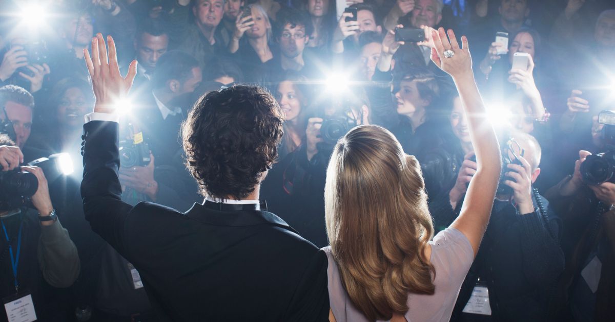 Good Posture While Waving to a Crowd