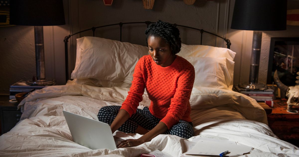 Good Posture on Bed While Using a Laptop