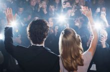 Good Posture While Waving to a Crowd