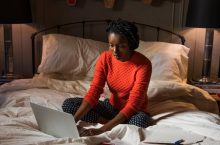 Good Posture on Bed While Using a Laptop